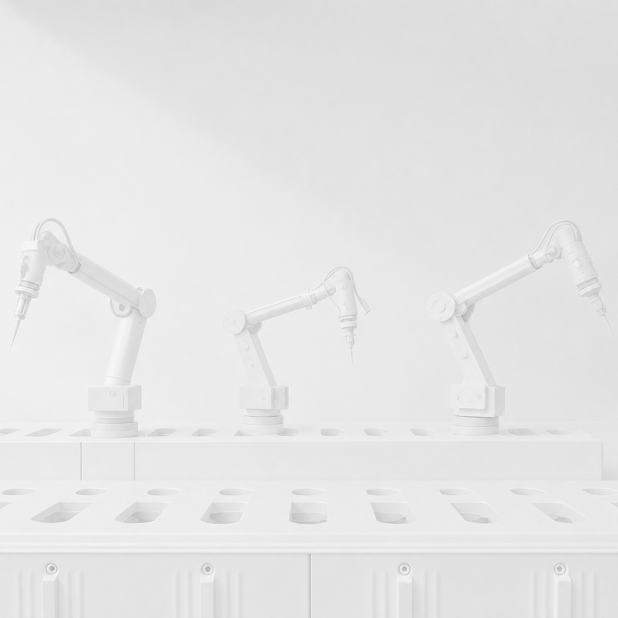 Three custom Deployed robotic arms on a production line.